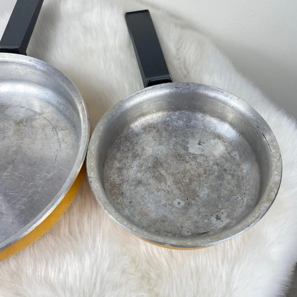 Pair of 70s West Bend Yellow Enamel Frying Pans